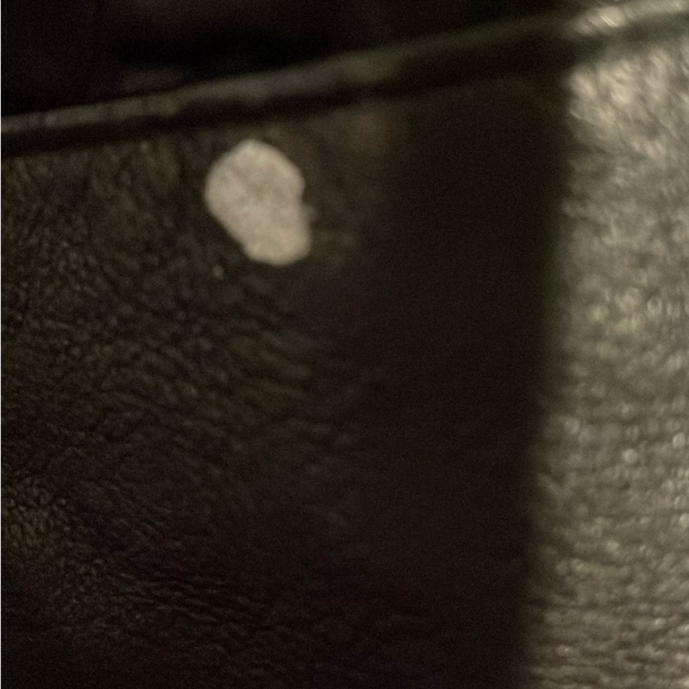 Leather coat poor condition
